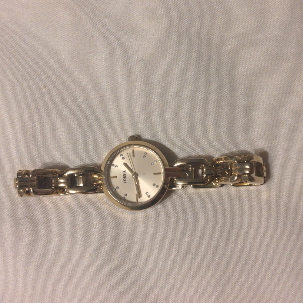 Women's gold fossil watch